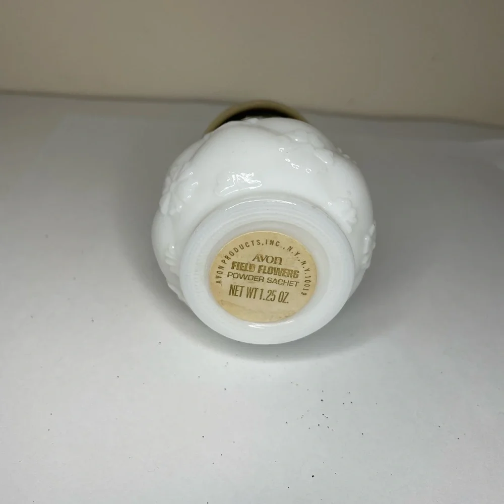Avon milk glass powder dispenser ( empty) Vintage